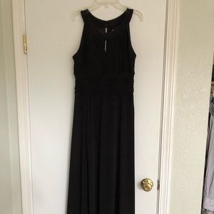 Full length black dress with Grecian neckline